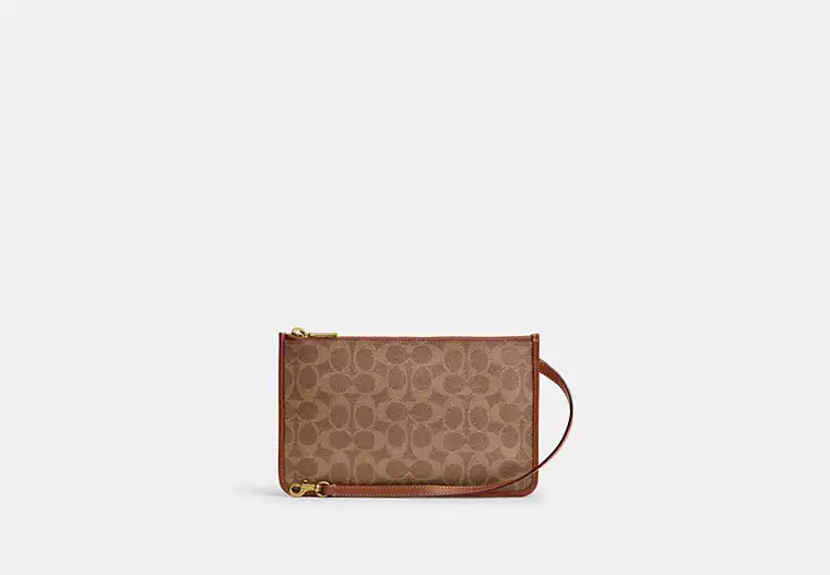 Pochette zippée en toile exclusive